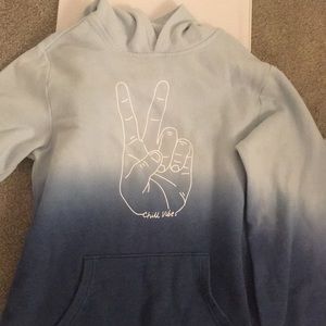 Blue tye tie hoodie with peace hand sign